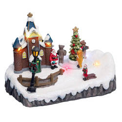 Karácsonyi városka, ünnepi jelenet betlehemesekkel