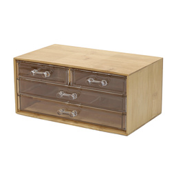 Sminkeszközök tárolója négy átlátszó fiókkal