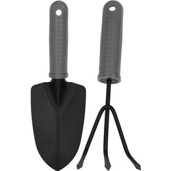 Alapvető kertészeti eszközök, készlet, kis gereblye és lapát.